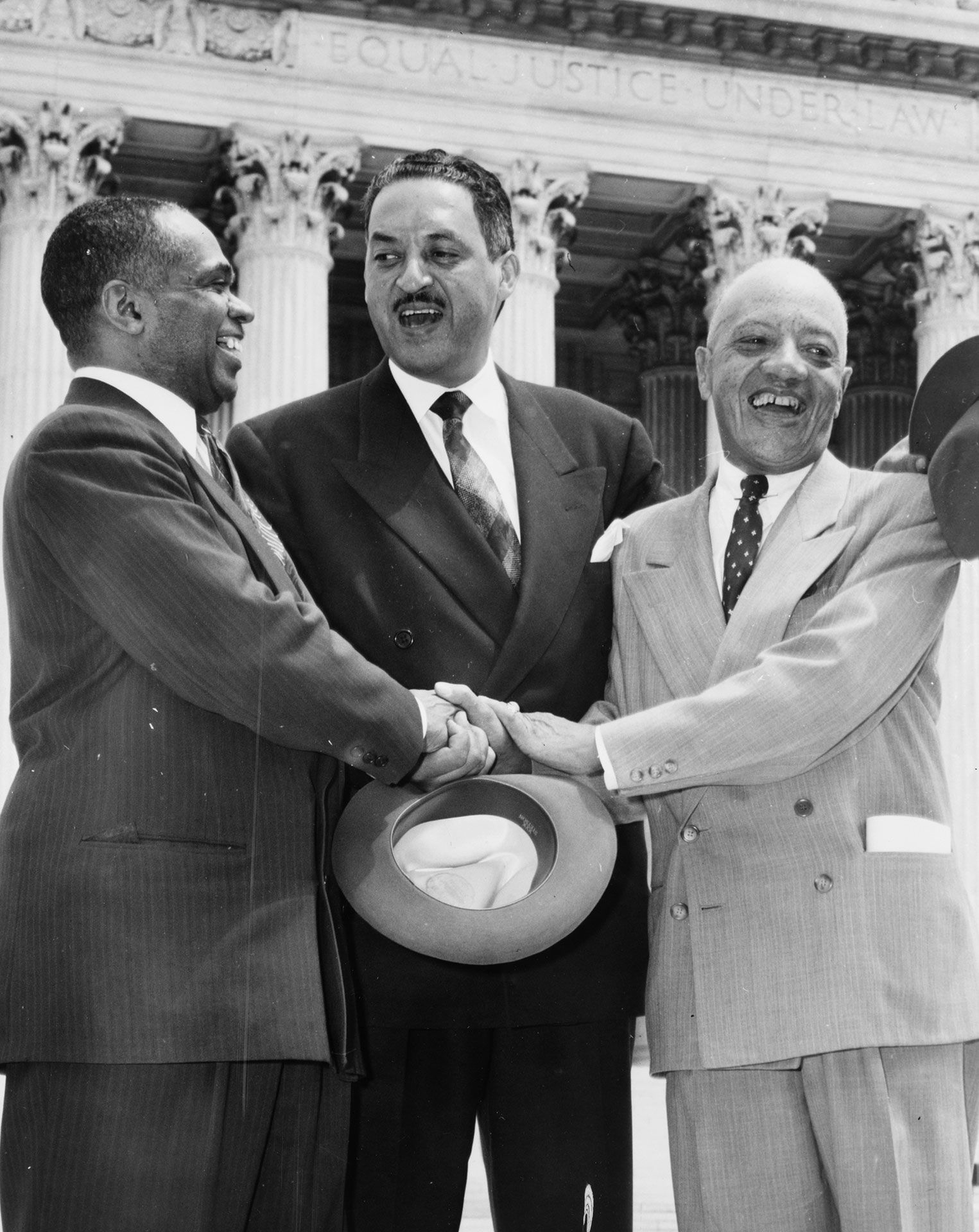 NAACP lawyers win Brown v. Board of Education (1954)